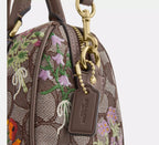 Coach Mini Rowan Crossbody Bag In Signature Jacquard With Floral Embroidery - Gold/Oak Multi
