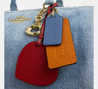 Coach Rowan Large Satchel Bag In Loved Denim With Charms -  Gold/Light Indigo